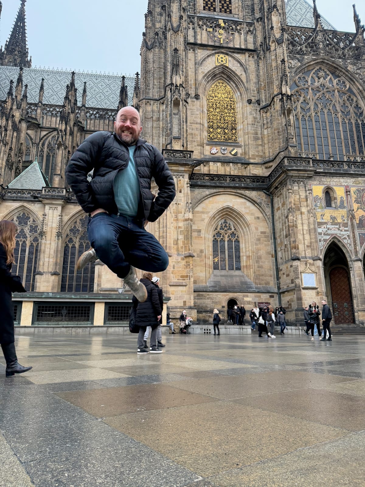 Heath jumping in front of St Vitus Cathedral in Prague
